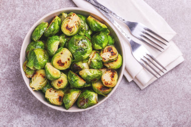 istock Vegetarian cuisine. Brussels Sprouts roasted with olive oil. Copyspace 922539064