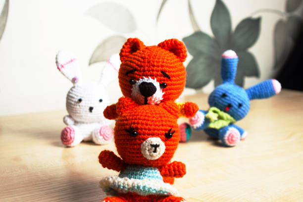 istock knitted toy cat, bear, rabbit, hare, handmade 922539282