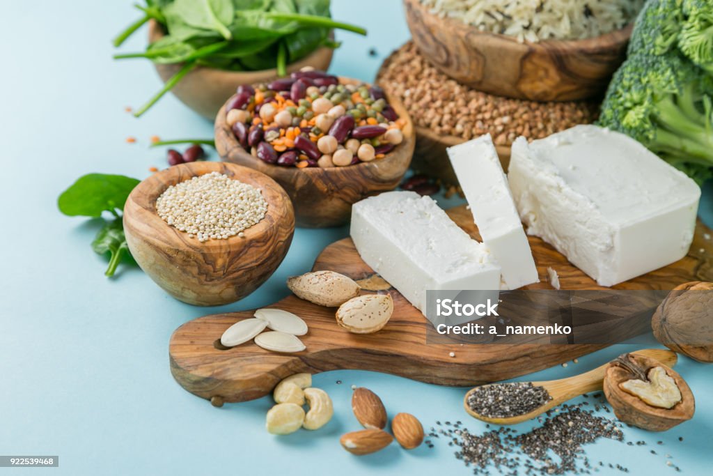 Selection of vegetarian protein sources - healthy diet concent Selection of vegetarian protein sources - healthy diet concent on bright blue background Protein Stock Photo