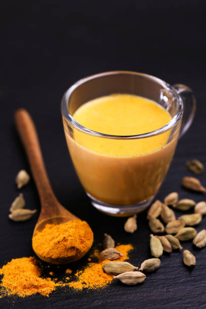 istock Indian turmeric milk with saffron, cardamom and turmeric. Copyspace 922540144