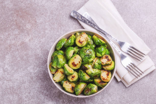 istock Vegetarian cuisine. Brussels Sprouts roasted with olive oil. Copyspace 922540282
