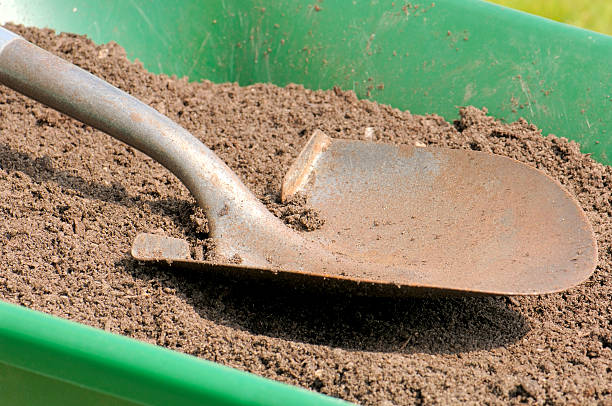 istock Gardening-Shovel-Sandy Soil-Wheelbarrow 92254055