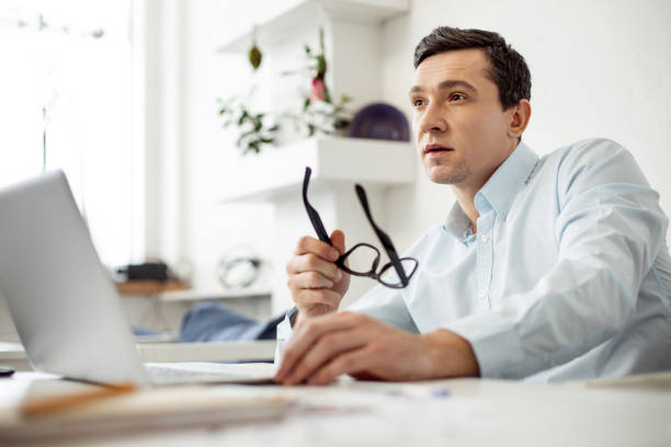 istock Thoughtful employer working on his laptop 922542788