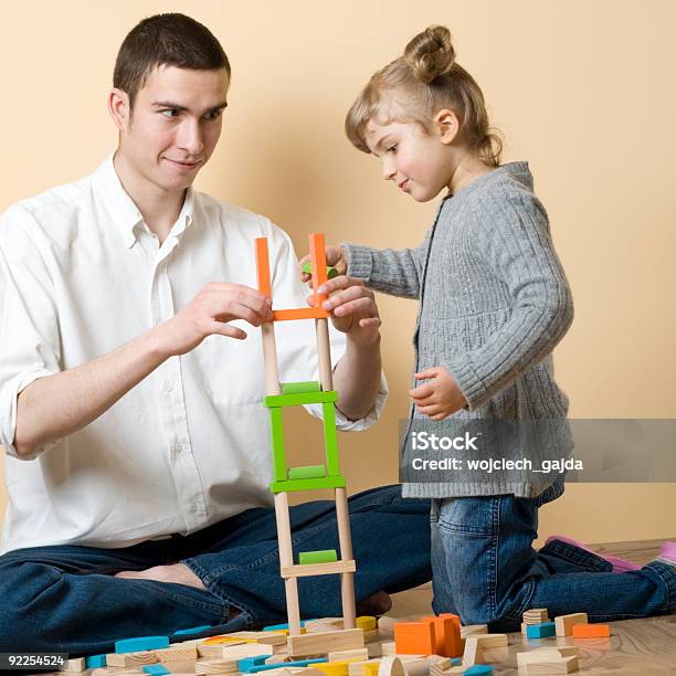 Tower Foto de stock y más banco de imágenes de Adulto - Adulto, Agarrar, Amor - Sentimiento