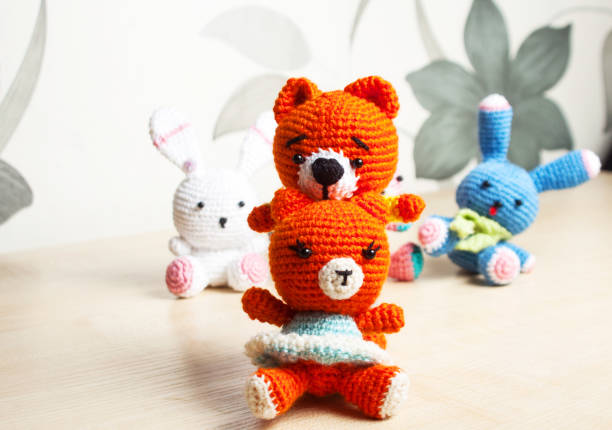 istock knitted toy cat, bear, rabbit, hare, handmade 922546436