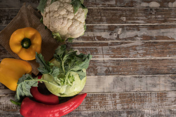 Healthy Organic Vegetables on a Wooden Background