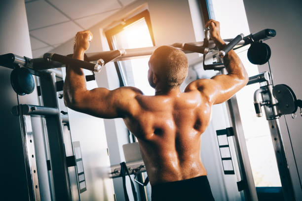 istock Strong man exercising in a gym. 922548522