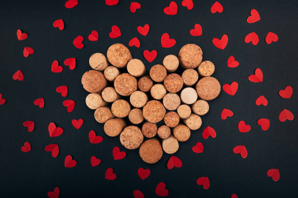 istock Valentine heart from wine corks on blackbackground 922555438