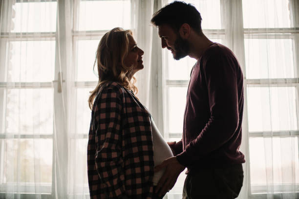 istock Young loving couple expecting a baby 922555678