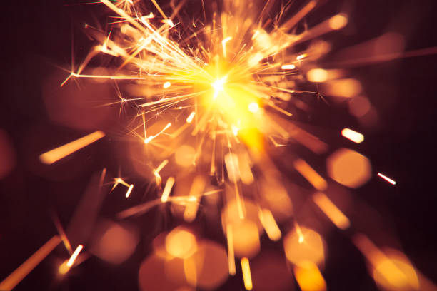 istock Abstract Golden Sparks - Sparkler Background Party New Year Celebration Technology 922556608