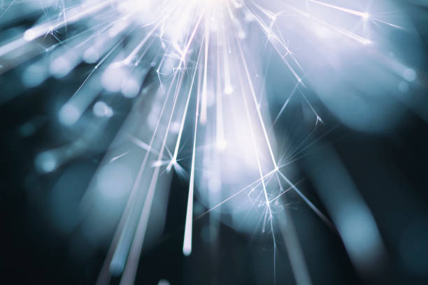 istock Abstract Blue Sparks - Sparkler Background Party New Year Celebration Technology 922561106
