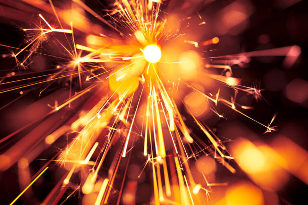 istock Abstract Red Centered Sparks - Sparkler Background Party New Year Celebration Technology 922562142