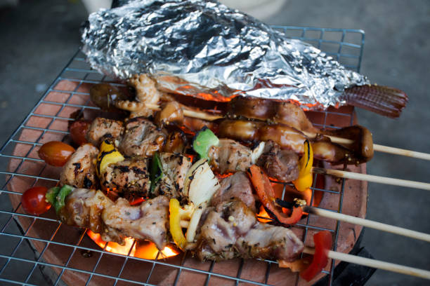 istock Thai people cooking meat and seafood BBQ on Stove 922562400