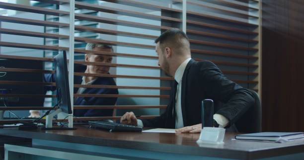 istock Businessman asking colleague for advice 922562518