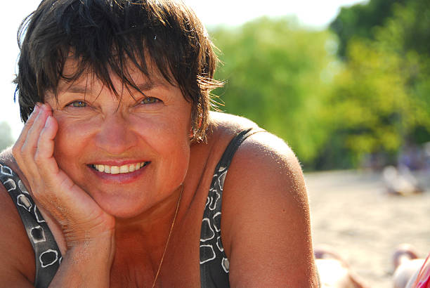 istock Mature woman beach 92256351