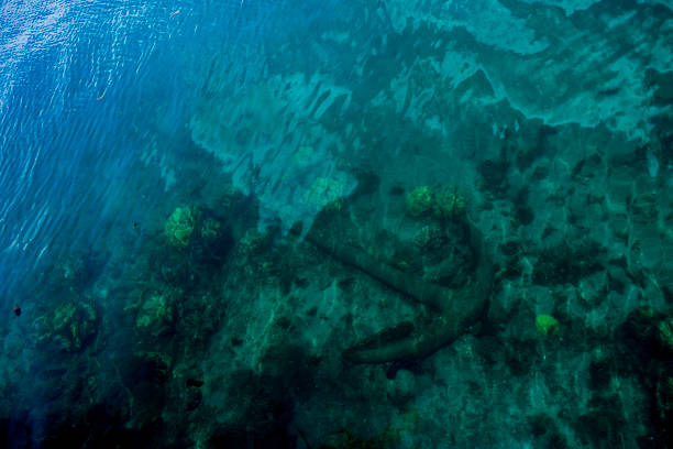 istock submerged anchor from under water, Tahiti, French Polynesia 922565406