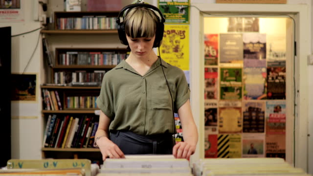 Young Woman Shopping in a Record Store