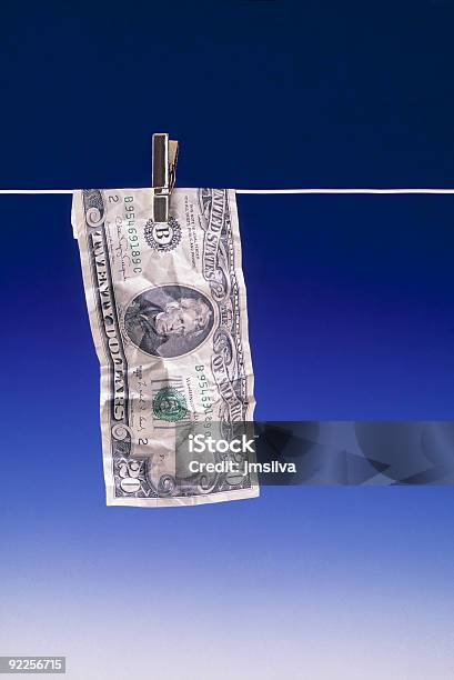 Dinero De Lavandería Y Planchado Foto de stock y más banco de imágenes de Billete de banco - Billete de banco, Billete de veinte dólares estadounidense, Blanqueo de dinero