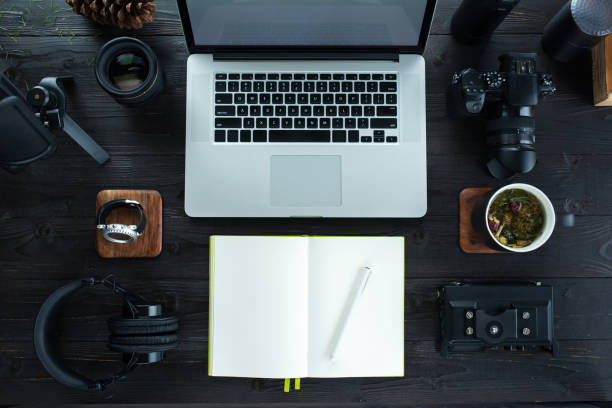 istock Audio / Video editing workspace office with mountain view. Photography and videography equipment. 922569962