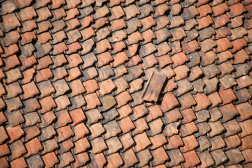 Roof tiles of old traditional thai wooden building in Bangkok Chatuchak