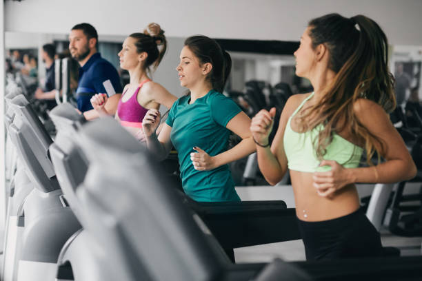 istock People working out in the gym. 922579250
