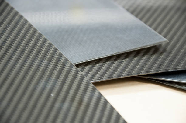 istock Black carbon fiber composite material background 922580010