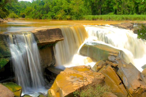 istock waterfalls background: Kaeng sopha waterfall in Thung Salaeng Luang National Park, Phitsanulok, Thailand. Namtok Kaeng Sopha is a waterfall and tourist attraction 922580106