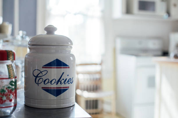 Vintage retro jar with cookies in kitchen stock photo