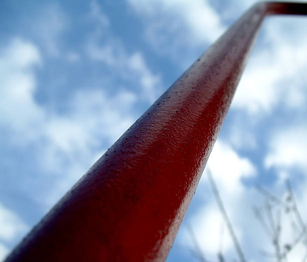 looking up a red pole stock photo