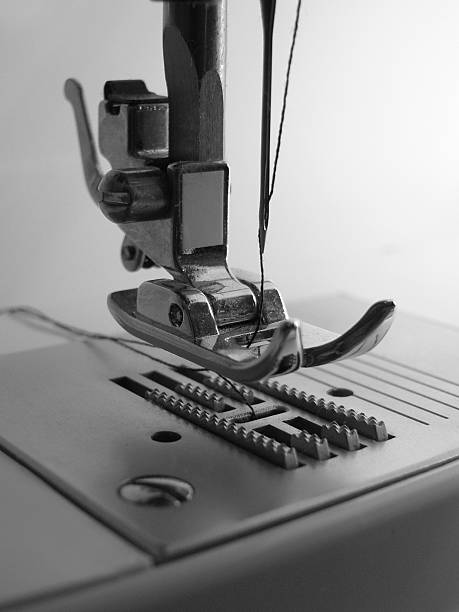 sewing machine closeup stock photo