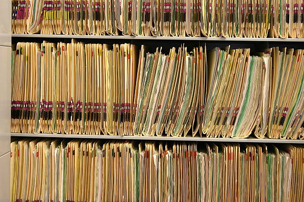 istock Rack full of old medical records 92259314