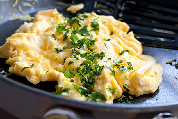 Cooking Scrambled Eggs stock photo