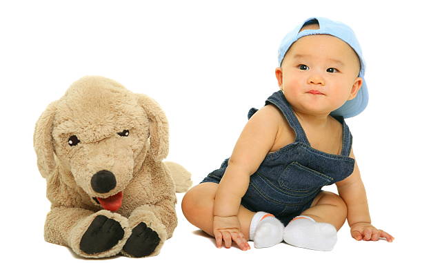 istock Adorable Baby Sit With His Stuffed Animal 92260080