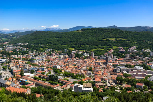 Elevated view in Summer of the city of Gap in Hautes-Alpes. French Alps, France Elevated view in Summer of the city of Gap in Hautes-Alpes. Southern French Alps, France hautes alpes photos stock pictures, royalty-free photos & images