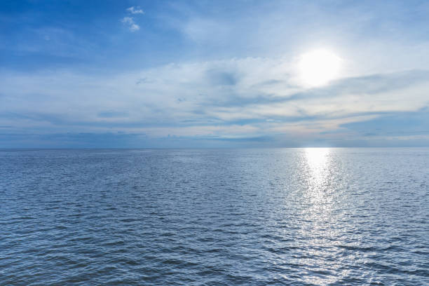 istock view of blue sky and big river with sun light reflect on surface river 922607646
