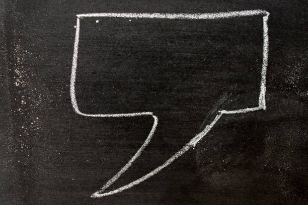 istock White color chalk hand drawing as speech bubble shape on black board background 922608124