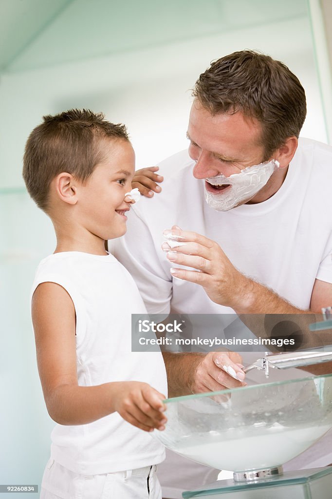 Man and son in Bathroom shaving  Father Stock Photo
