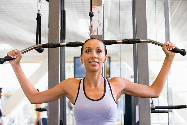 istock Woman Weight Training At Gym 92260963