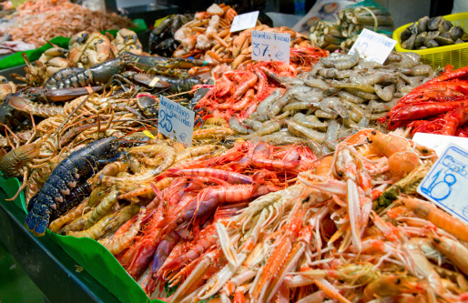 Great quantity of fresh seafood on fish market in Barcelona, Spain