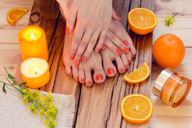 istock orange manicure around oranges and candles 922629588