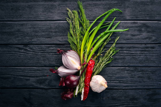 istock Onion on a wooden background. Top view. Free space for your text. 922629790