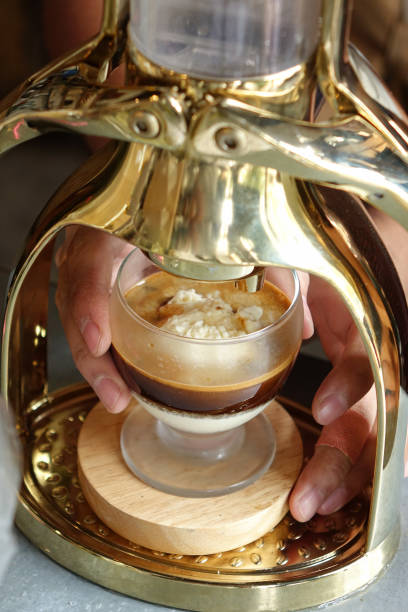 istock Espresso machine press coffee on vanilla ice cream 922633450