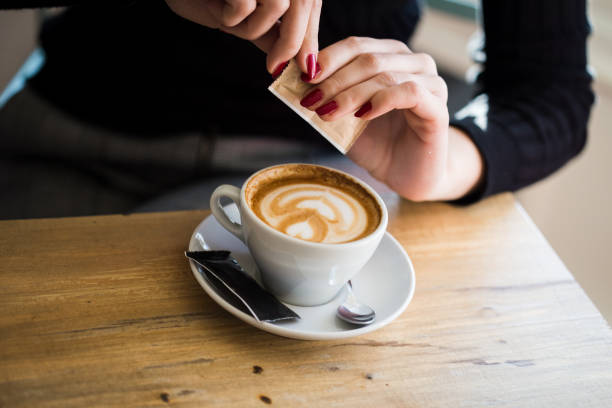 istock Women holding a cup of hot latte 922637298