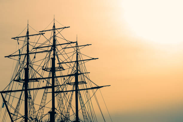 a part of a sailing ship, the masts of a ship, the sea - sailing ship nautical vessel rigging industrial ship imagens e fotografias de stock