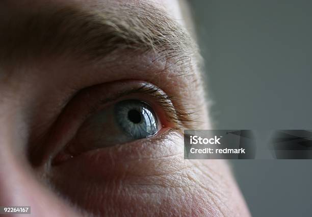 Blue Eye Looking Up Stock Photo - Download Image Now - Heaven, Men, Waking up