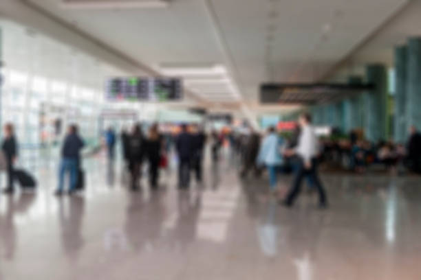 istock Defocused image of a modern airport terminal interior 922645836