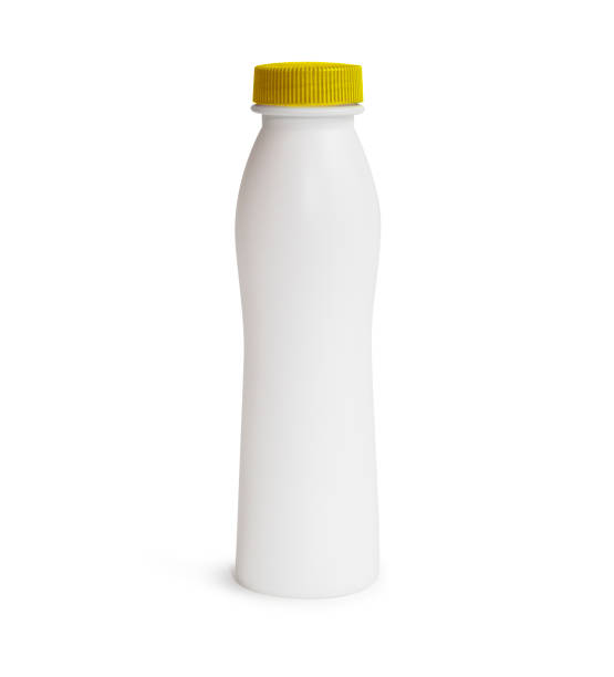 istock Milk or shampoo plastic bottle with yellow cap 922649104