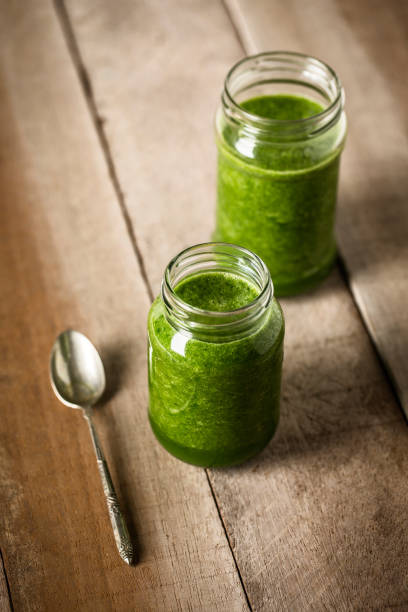 istock Two green juice glass 922649808