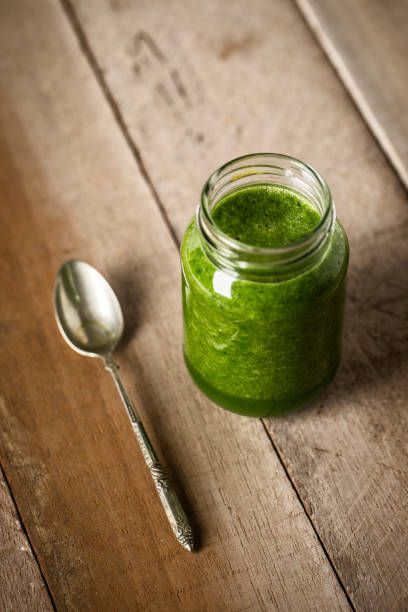istock Green juice glass 922649812