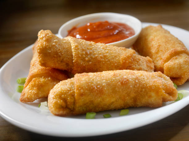 Homemade Egg Rolls with Dipping Sauce Homemade Egg Rolls with Dipping Sauce EGG ROLL stock pictures, royalty-free photos & images